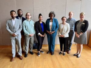 Group of people surrounding U.S. Ambassador to the UN Linda Thomas-Greenfield at Georgetown's Security Studies Summer Institute for HBCU Students.