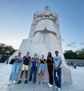 Group of students standing in front of the Martin Luther King Jr. Memorial in Washington, DC.